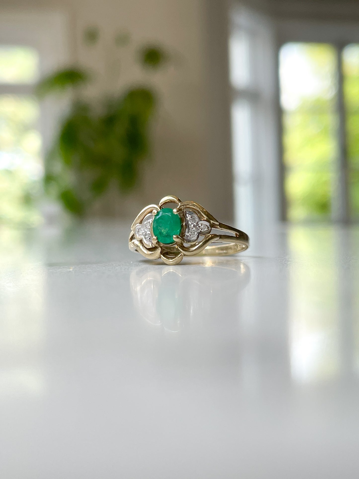 Vintage emerald and diamond dress ring