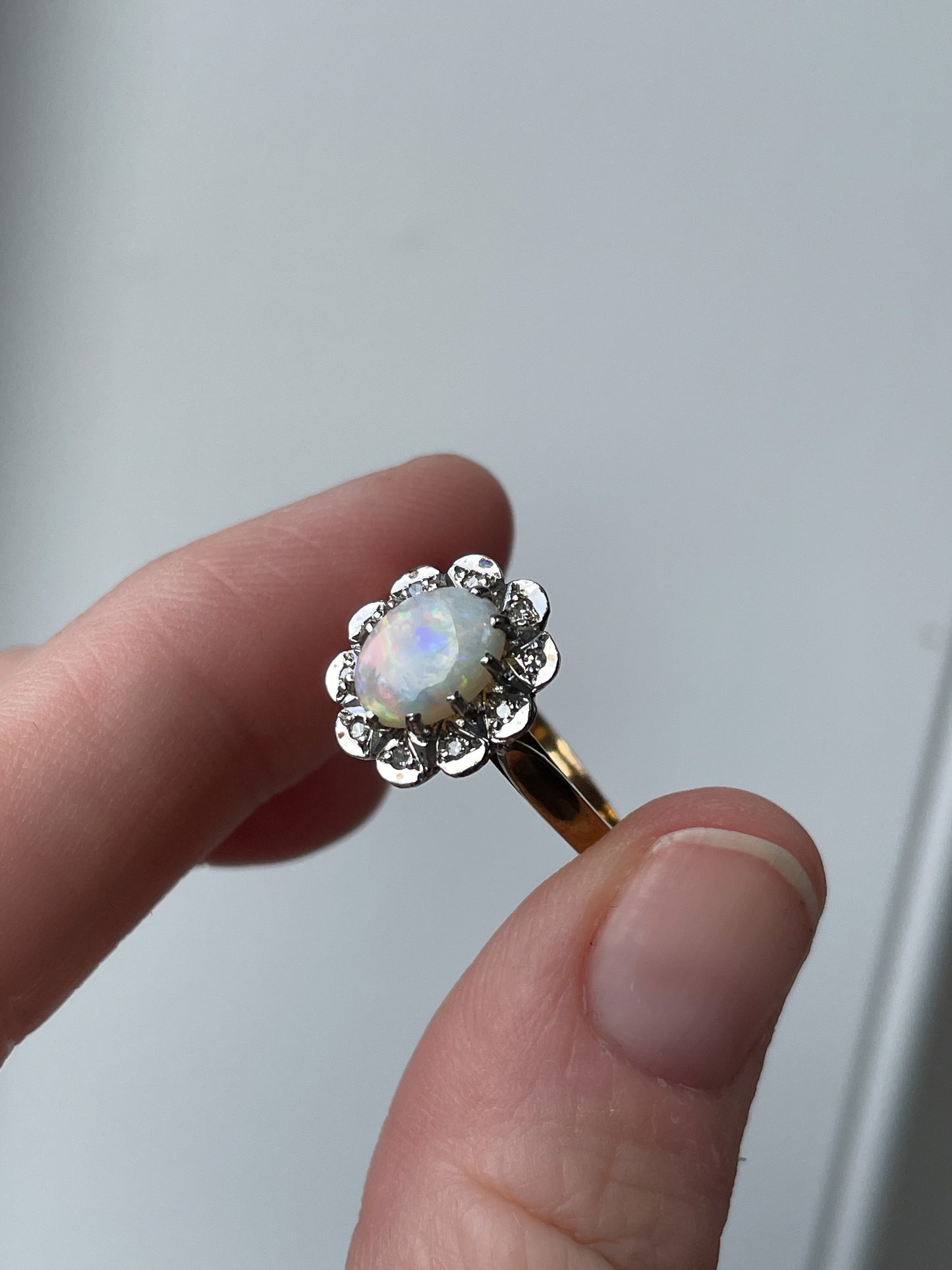 Vintage opal and diamond halo ring from 1988