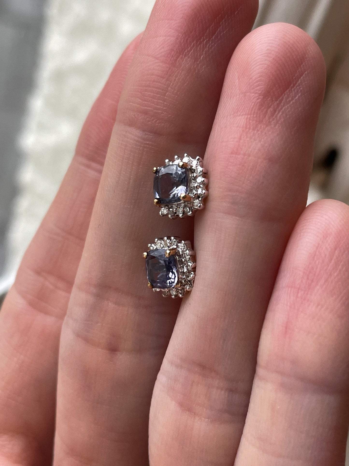 Tanzanite and diamond halo stud earrings on 9ct gold