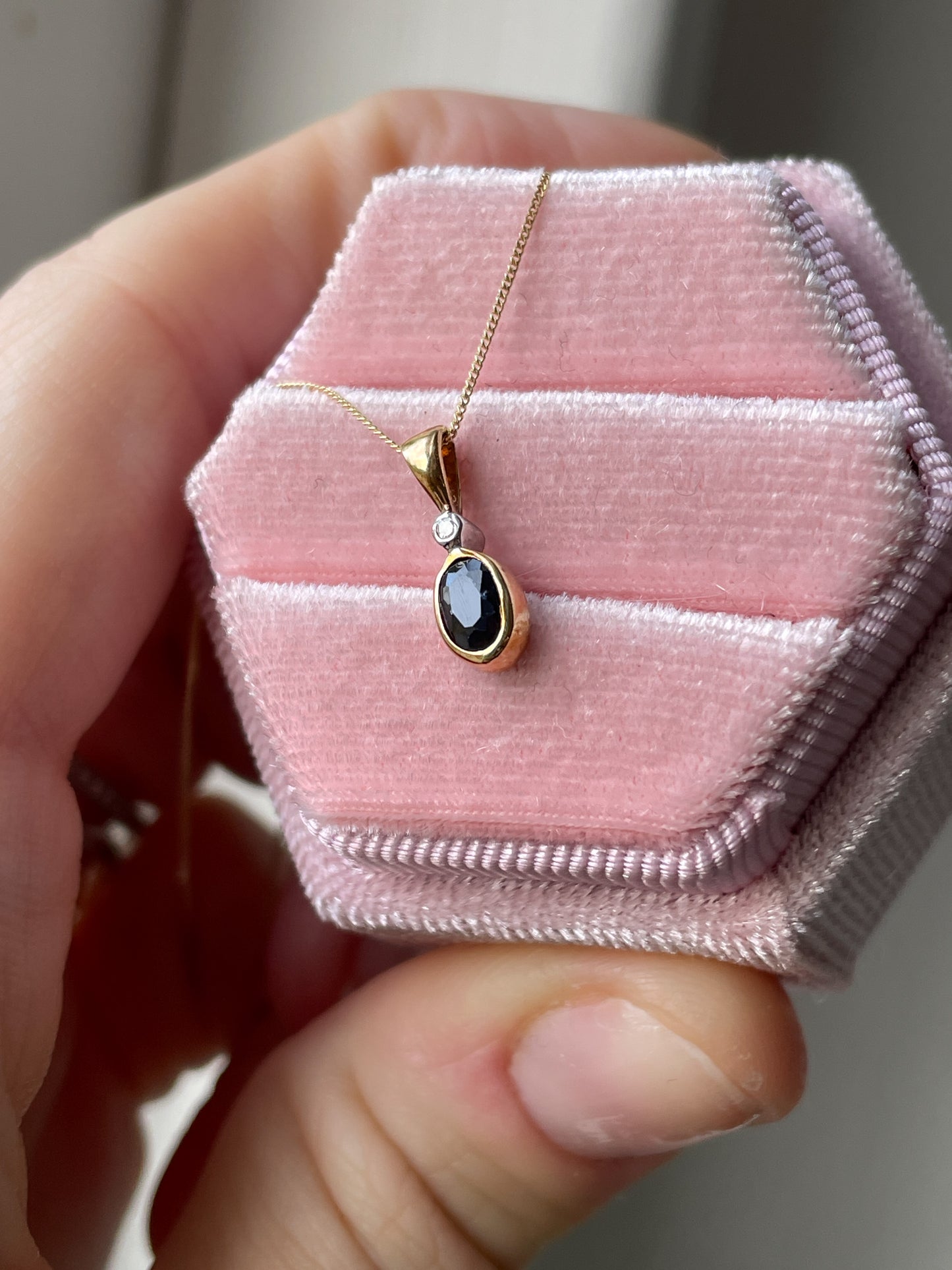 Sapphire and diamond necklace pendant on 9ct gold chain