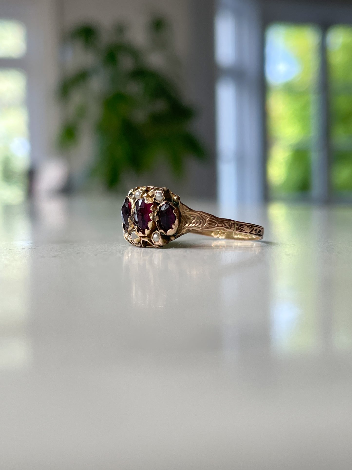 Antique rose-cut garnet and seed pearl ring on 9ct gold