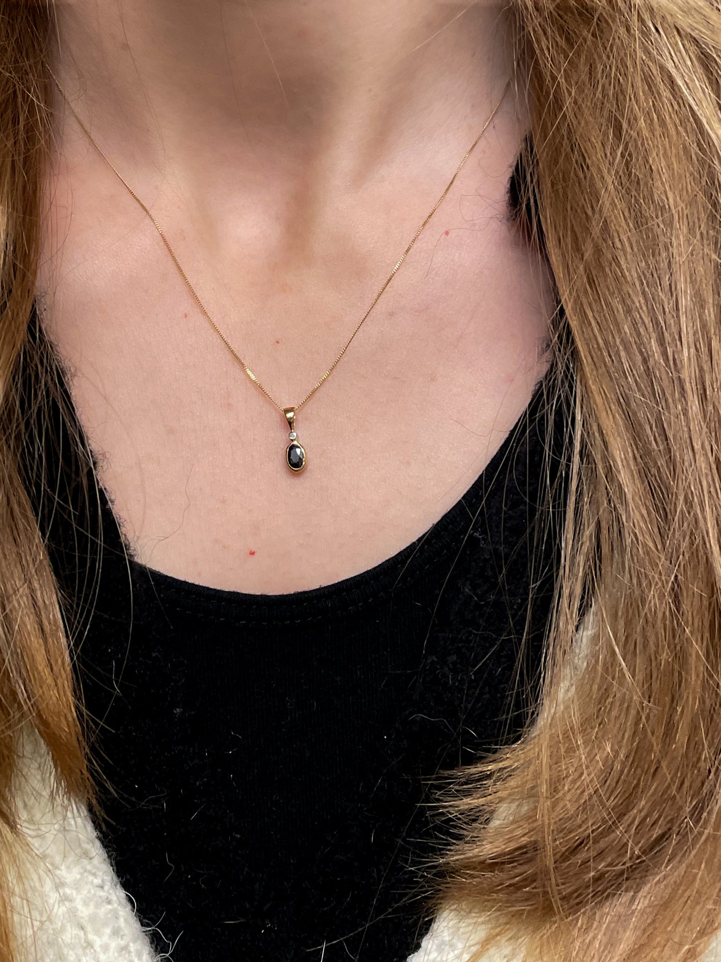 Sapphire and diamond necklace pendant on 9ct gold chain