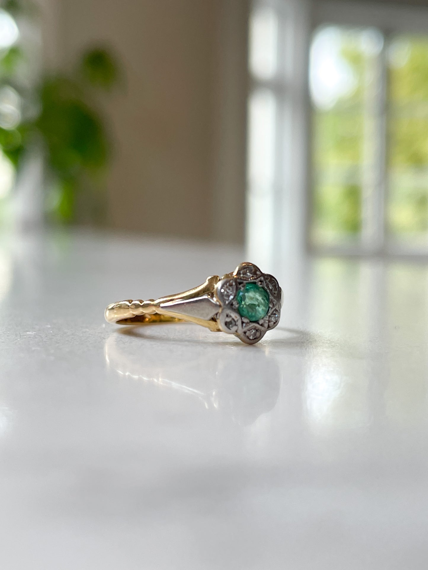 1960's Emerald and diamond halo cluster ring on 18ct gold