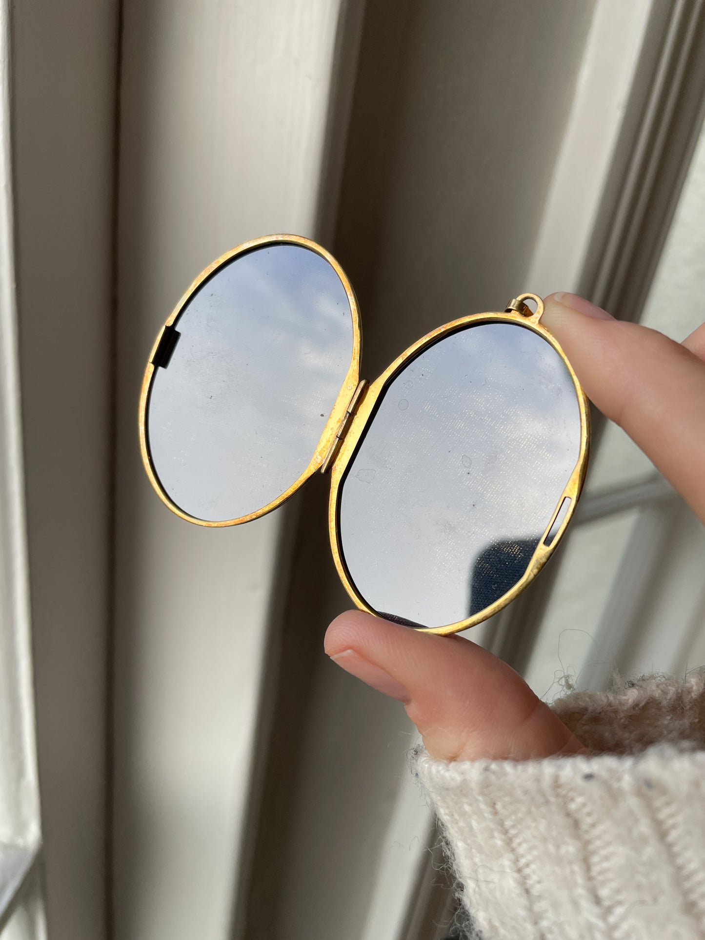 1970s large sterling silver locket with floral design