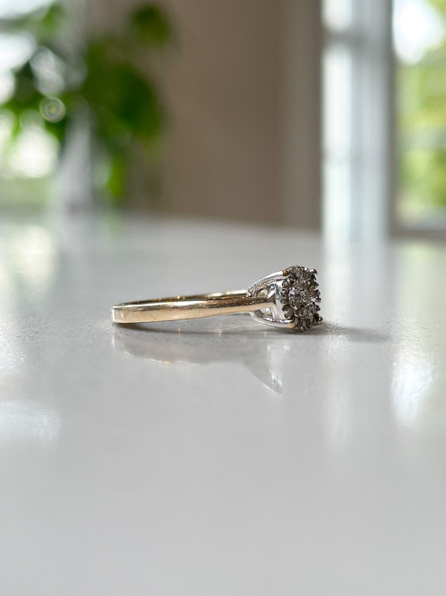Vintage diamond cluster ring on 9ct gold