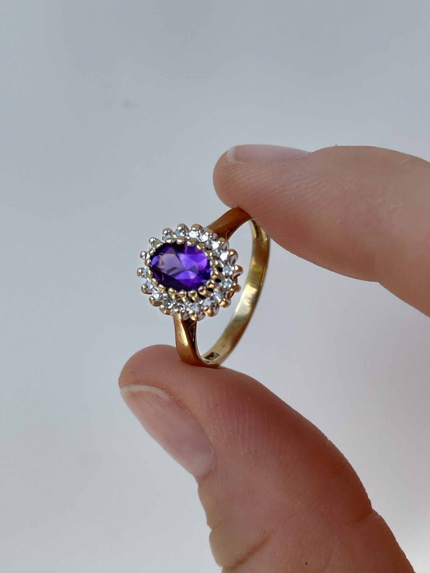 Vintage amethyst diamond halo ring on 9ct gold