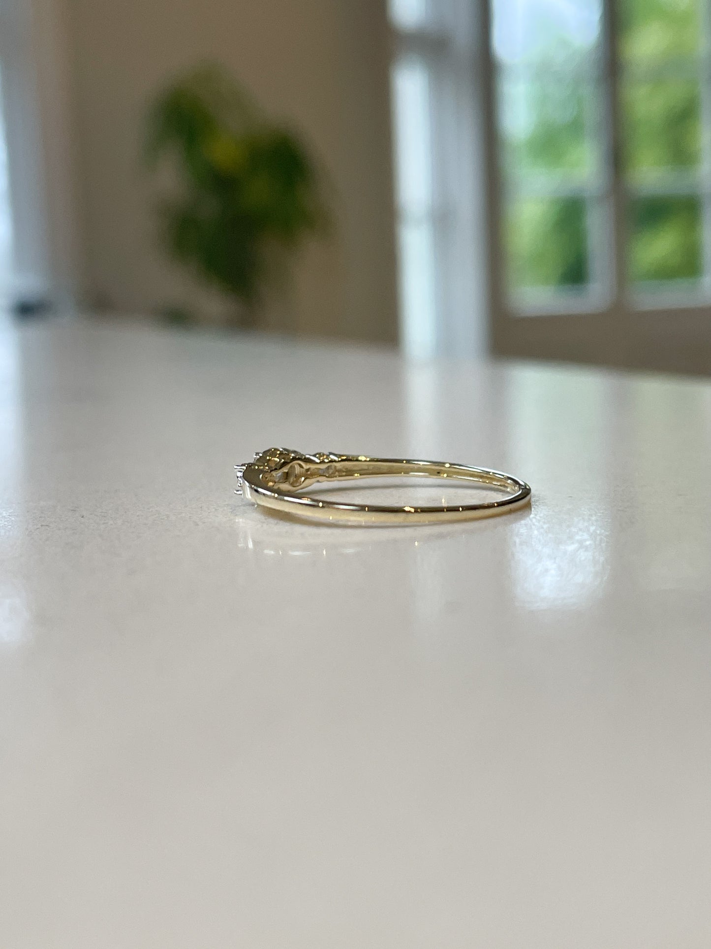 Contemporary diamond cluster ring on 9ct gold