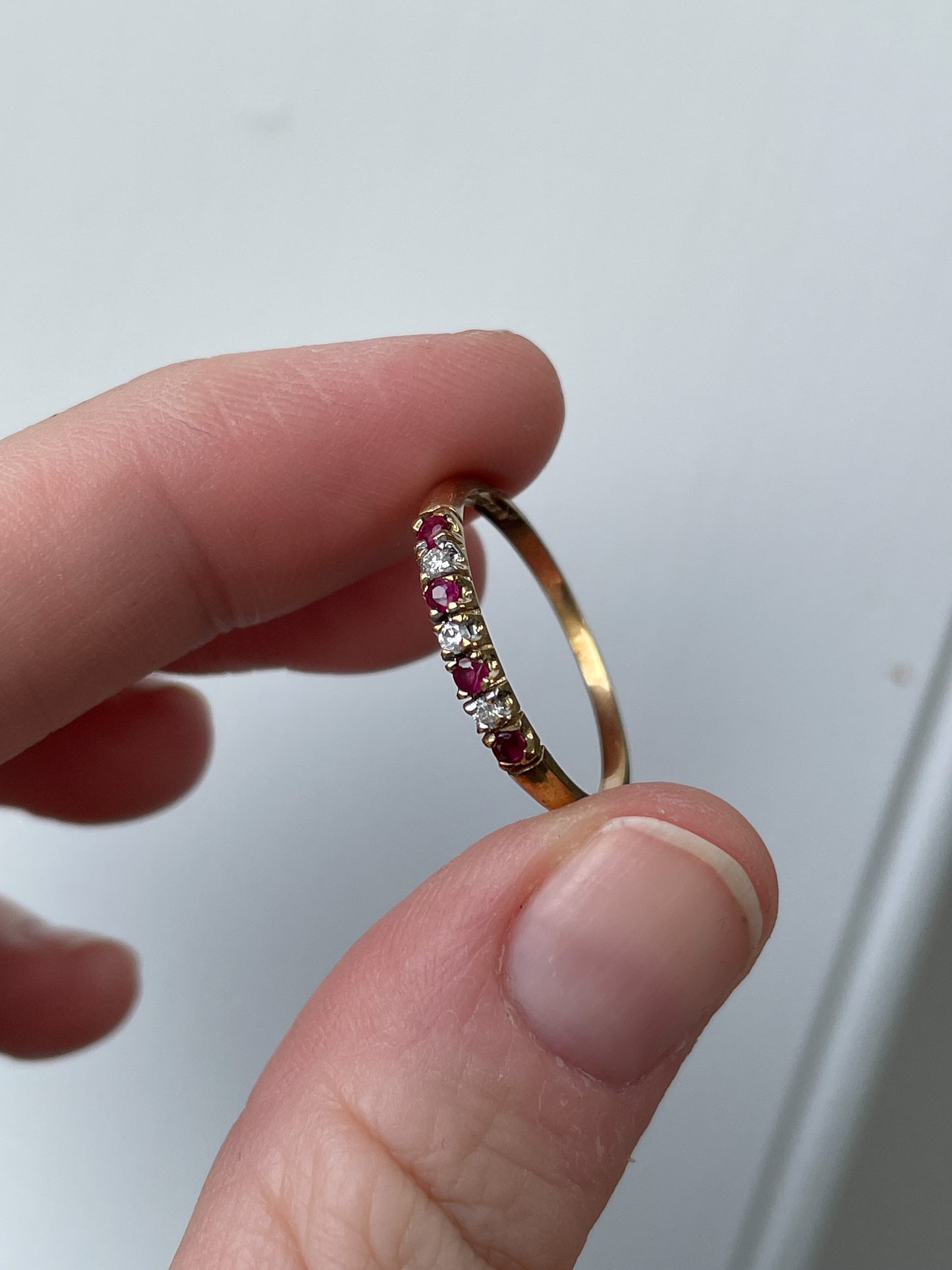 Vintage garnet and diamond half eternity ring