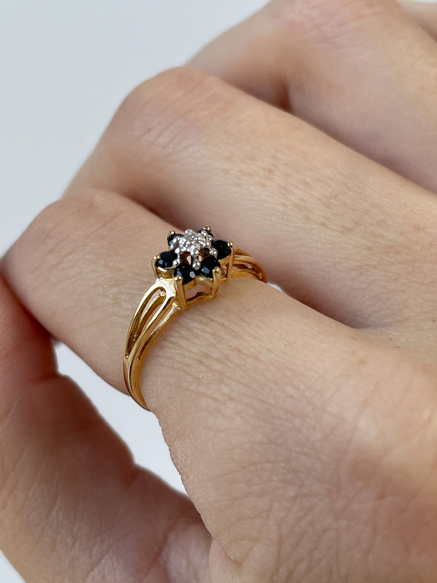 Vintage blue spinel and diamond floral cluster ring