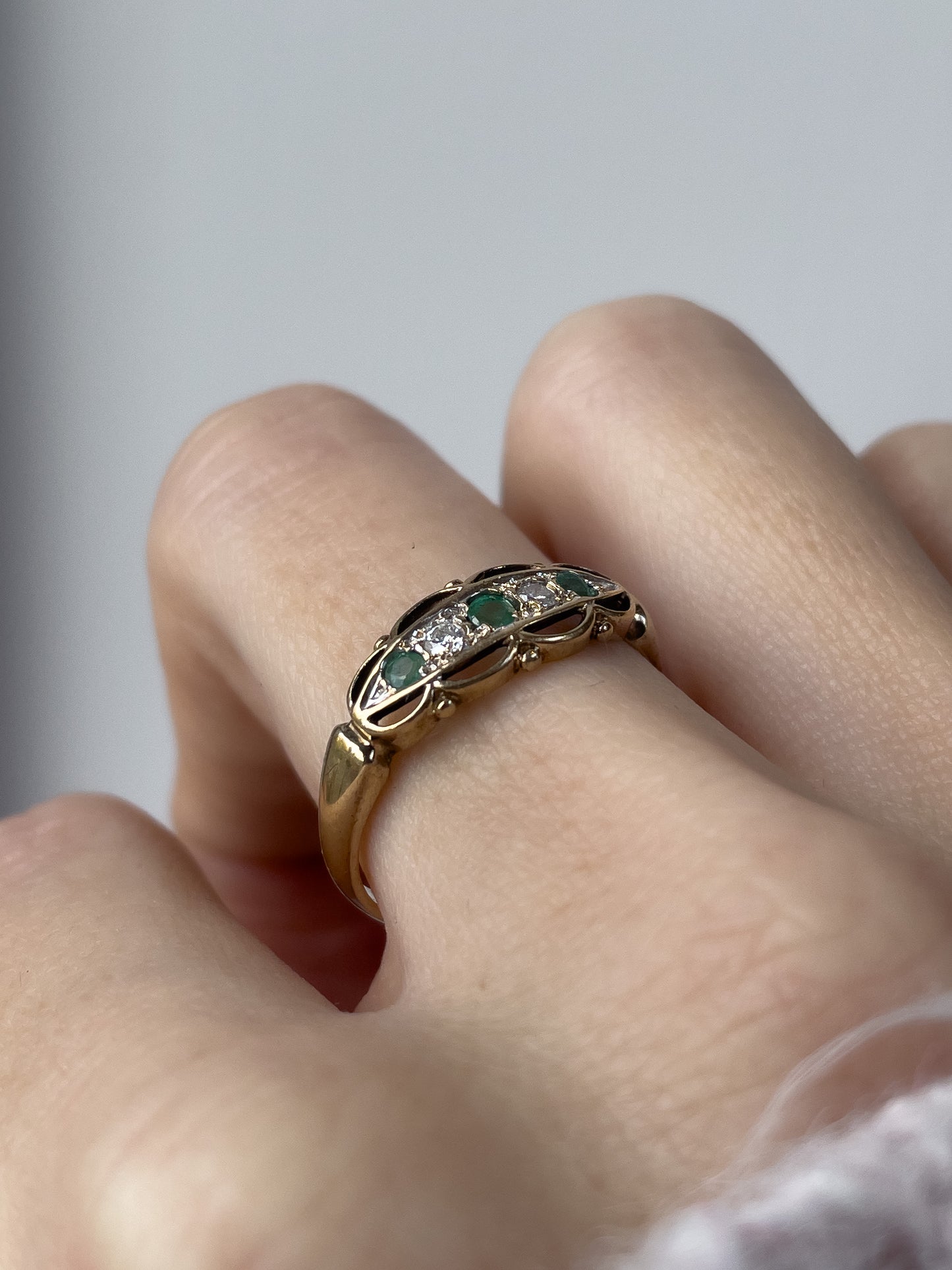 Vintage emerald and diamond boat ring on 9ct gold