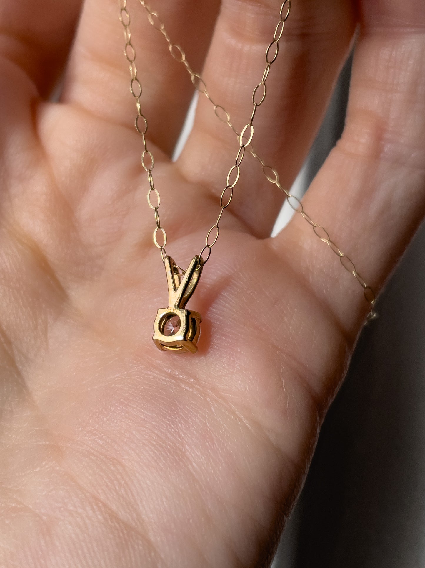 Vintage .25ct diamond solitaire pendant and chain