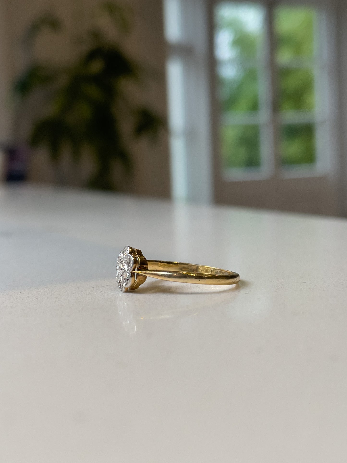 Antique diamond daisy cluster ring on 18ct gold