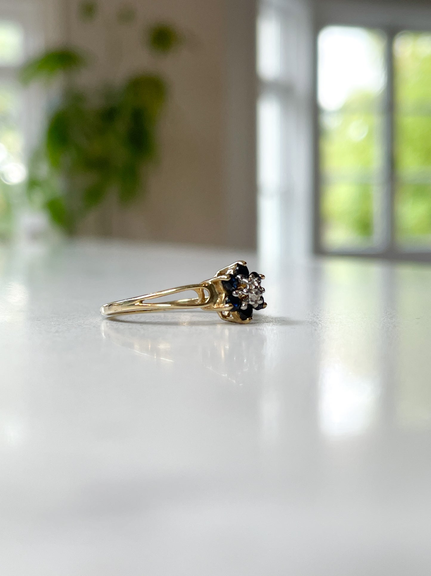 Vintage blue spinel and diamond floral cluster ring
