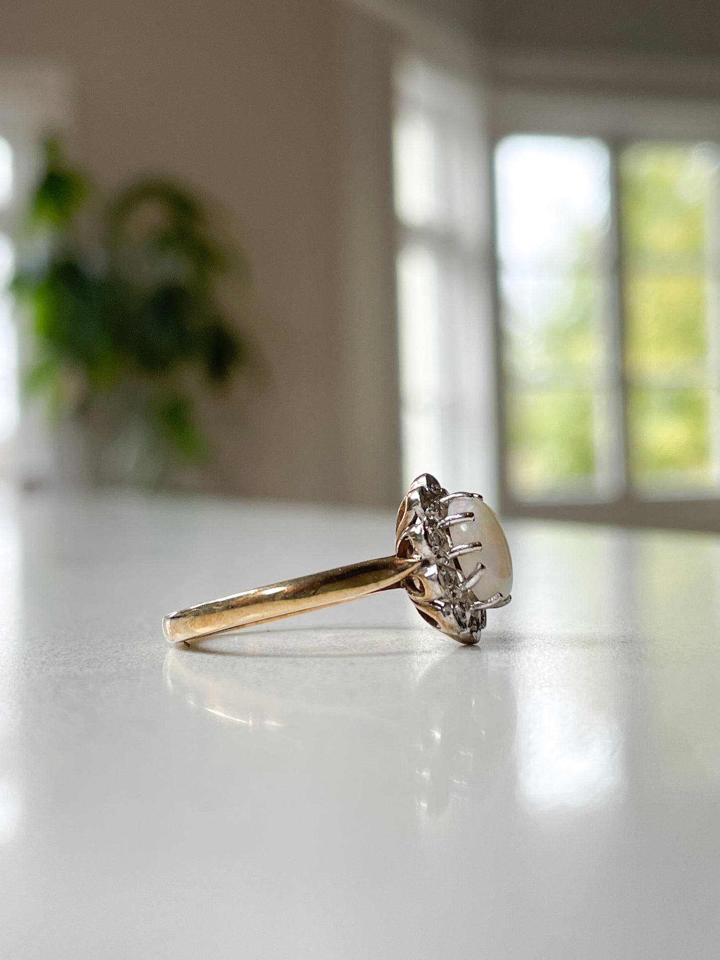 Vintage opal and diamond halo ring from 1988