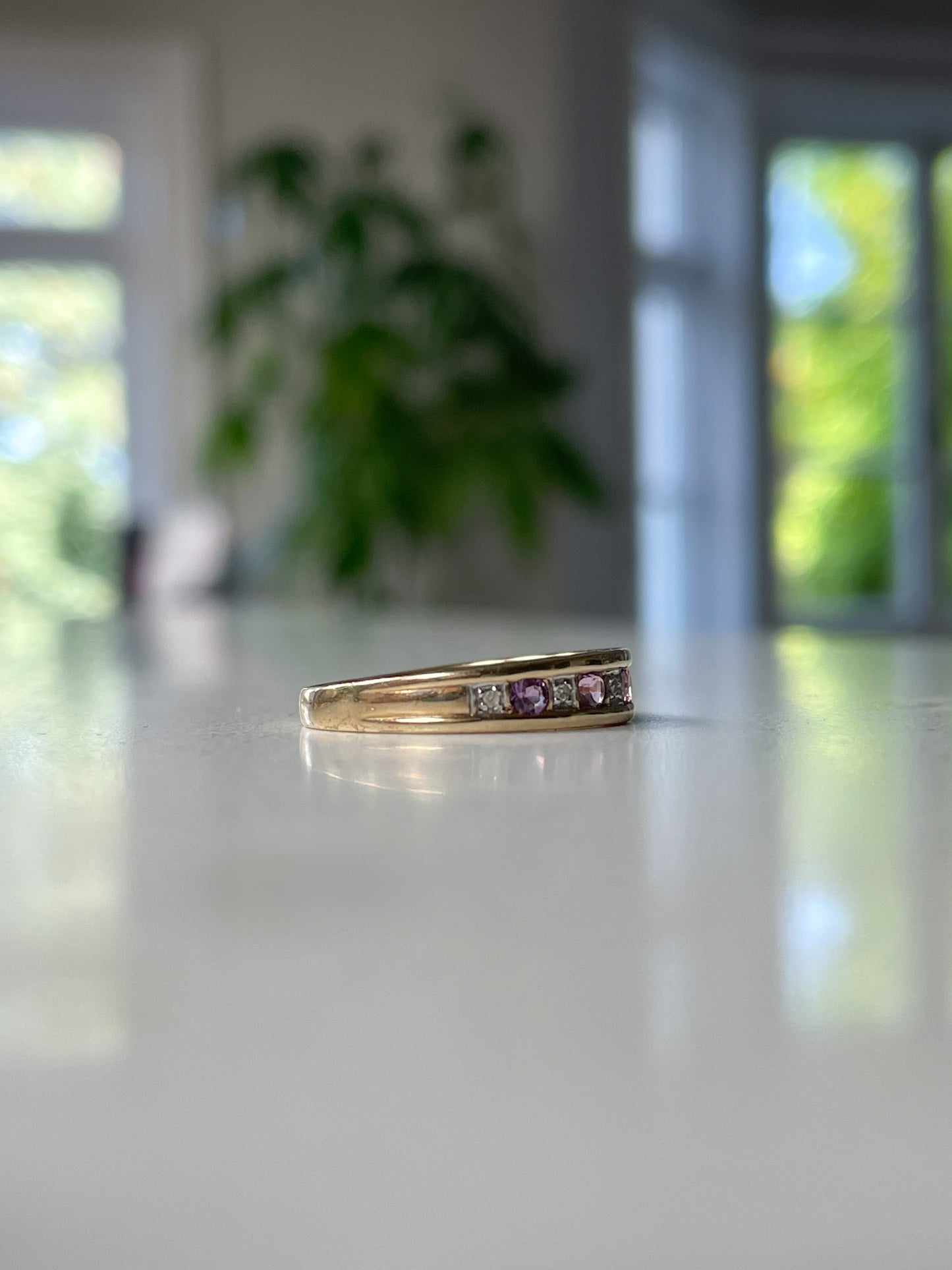 Vintage amethyst and diamond half eternity ring on 9ct gold