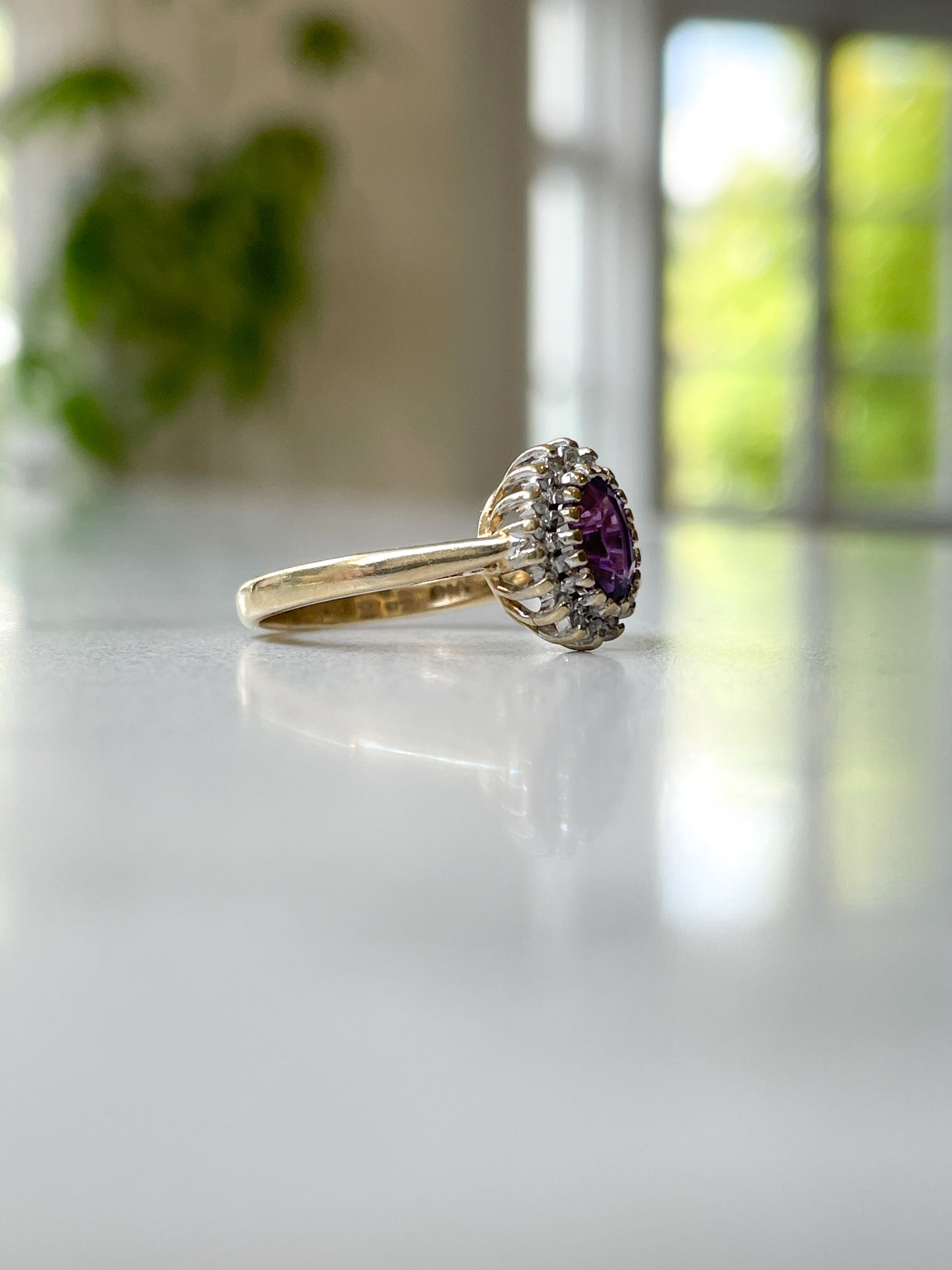 Vintage amethyst diamond halo ring on 9ct gold