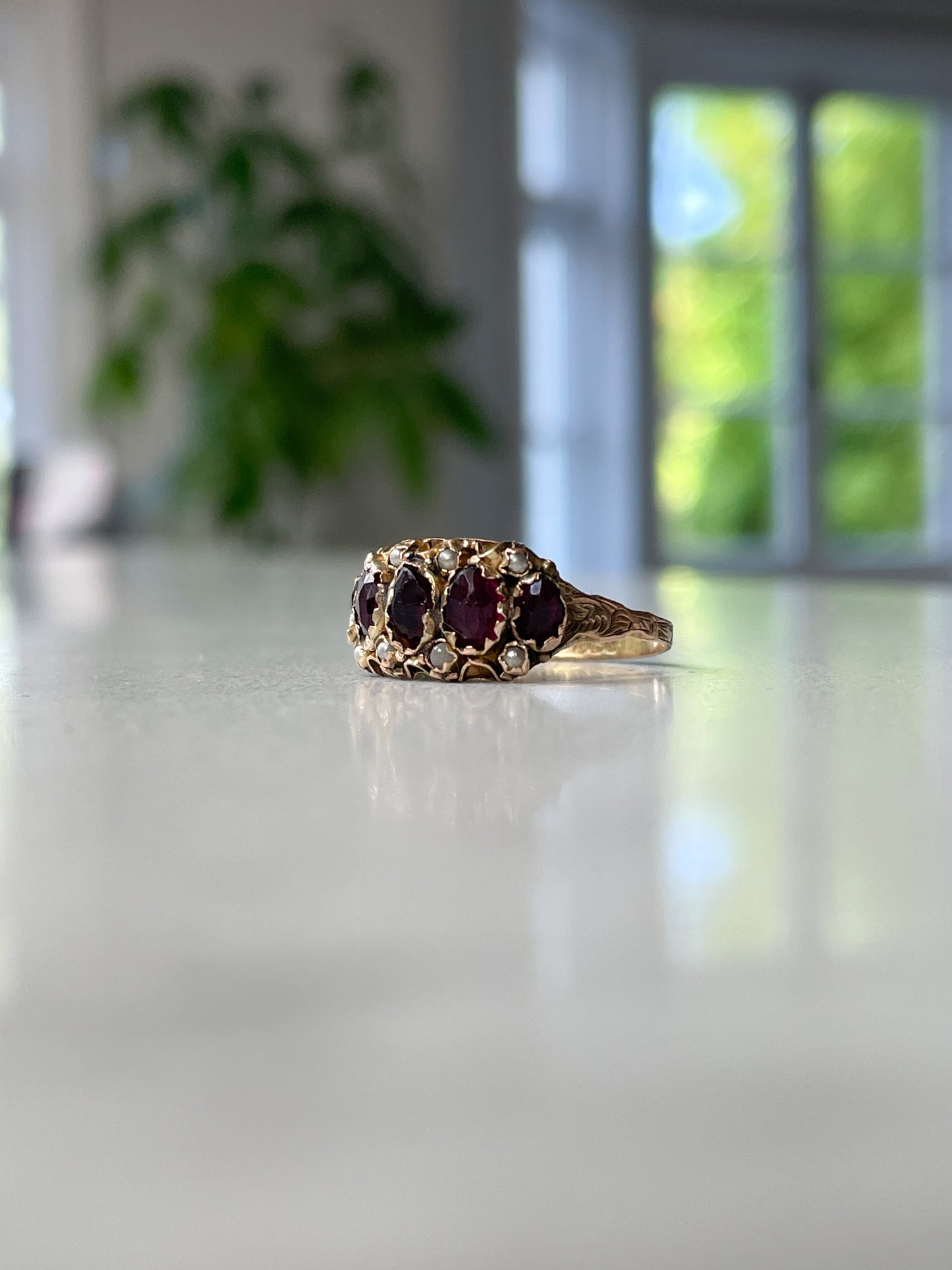 Antique rose-cut garnet and seed pearl ring on 9ct gold