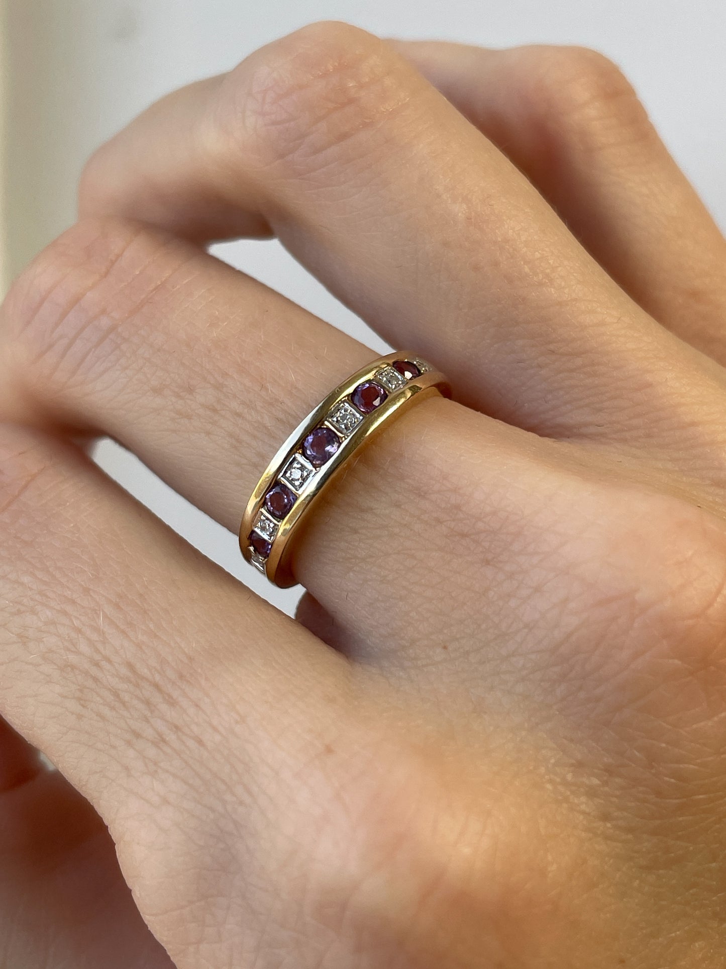 Vintage amethyst and diamond half eternity ring on 9ct gold
