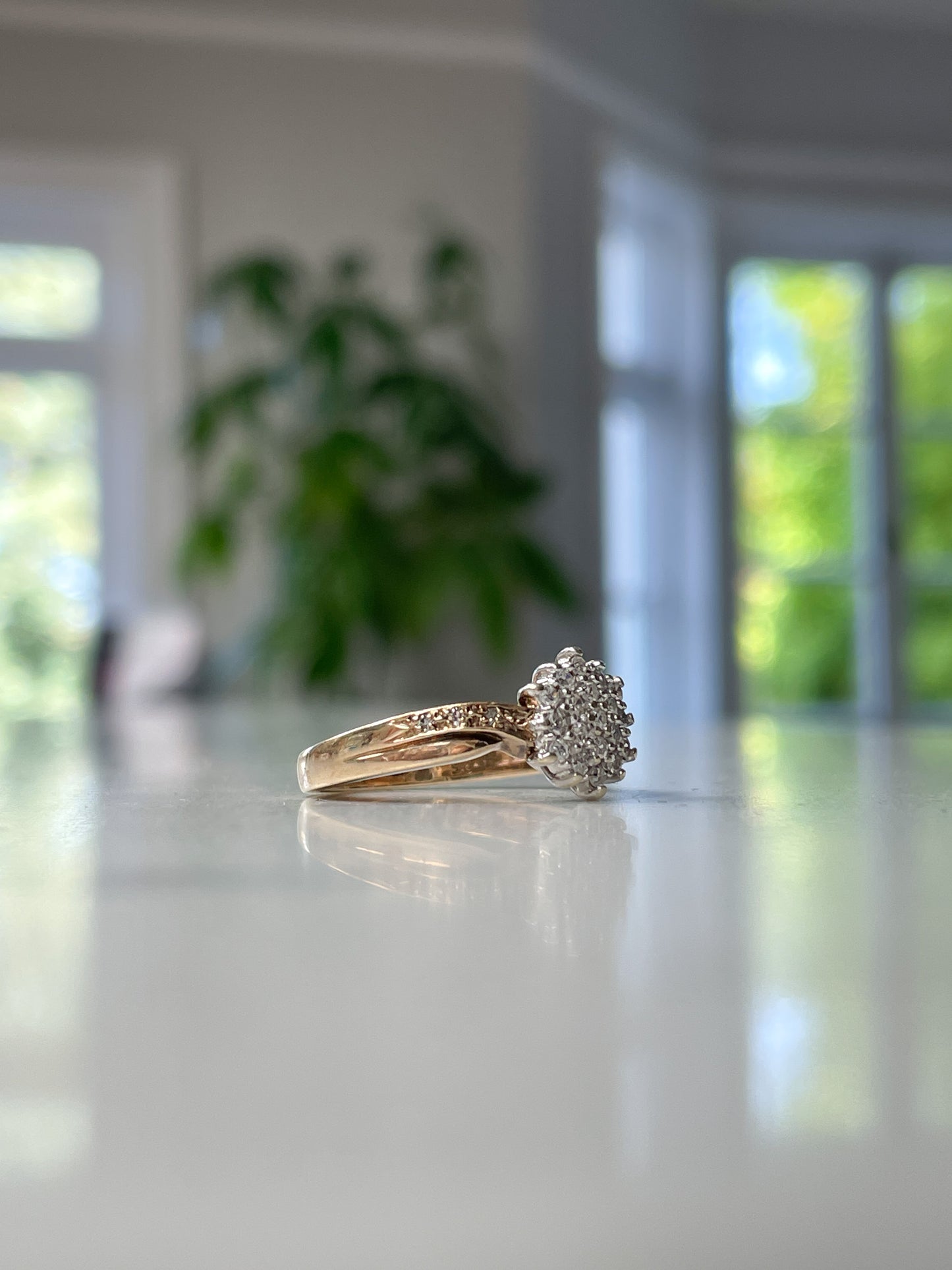 Vintage diamond cluster ring on 9ct gold