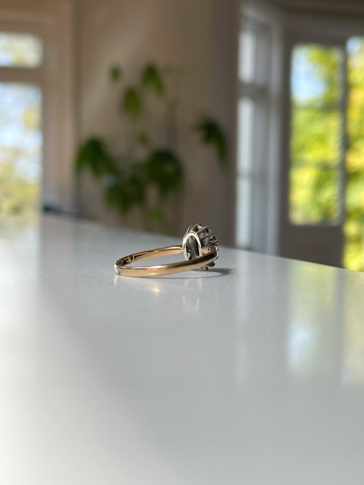 Vintage sapphire and diamond halo cluster ring on 9ct gold
