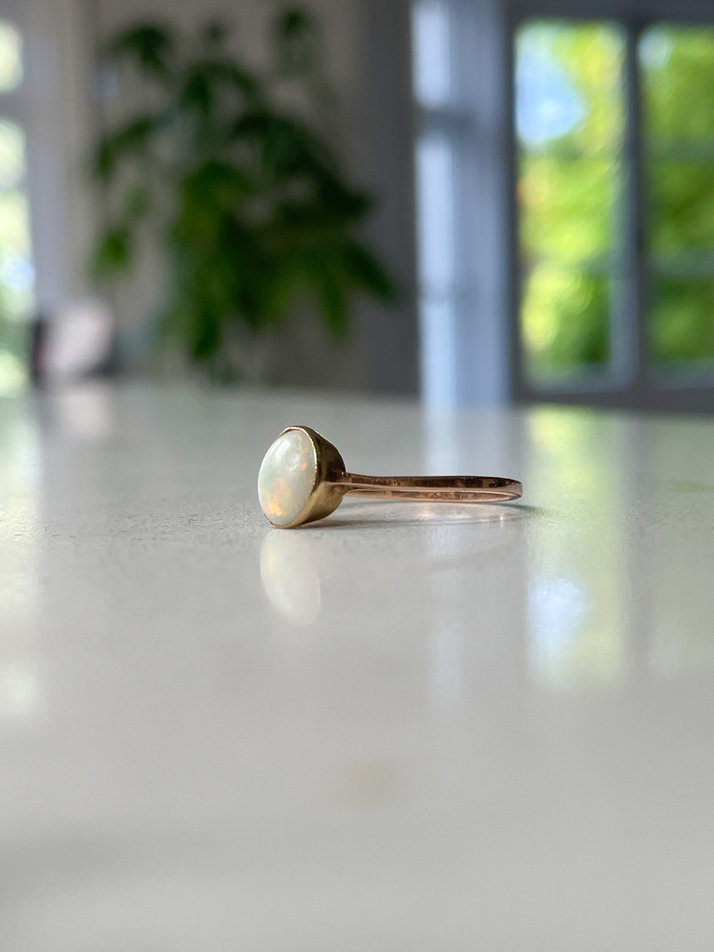 Antique opal solitaire ring on 9ct gold
