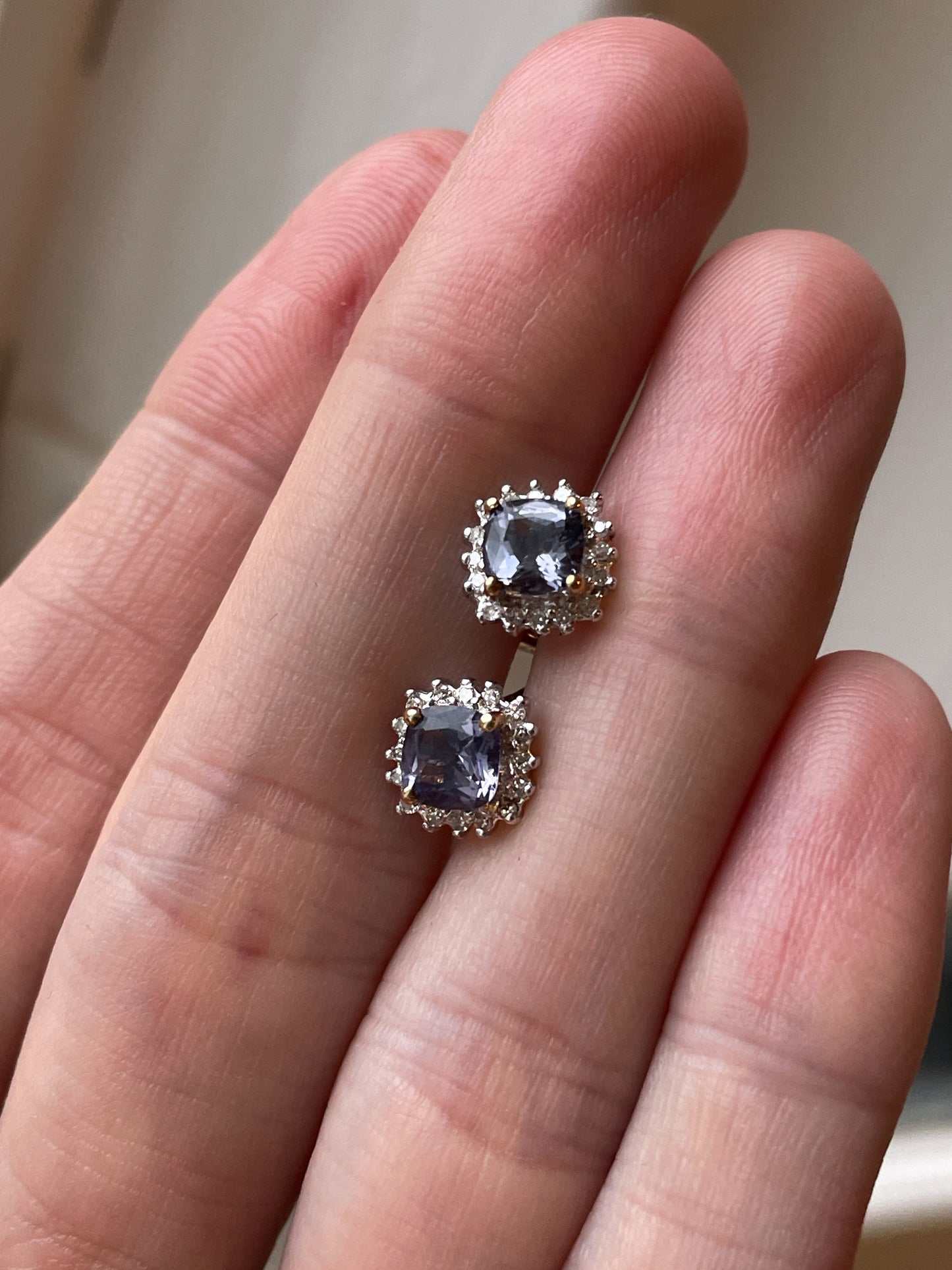 Tanzanite and diamond halo stud earrings on 9ct gold