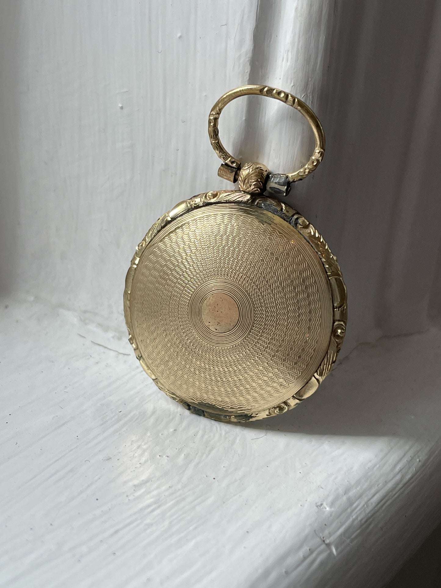 Antique mourning locket with glass cover