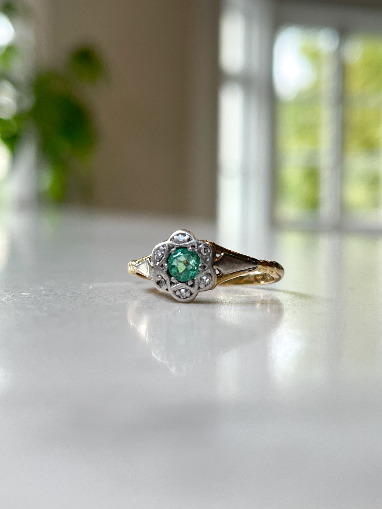 1960's Emerald and diamond halo cluster ring on 18ct gold