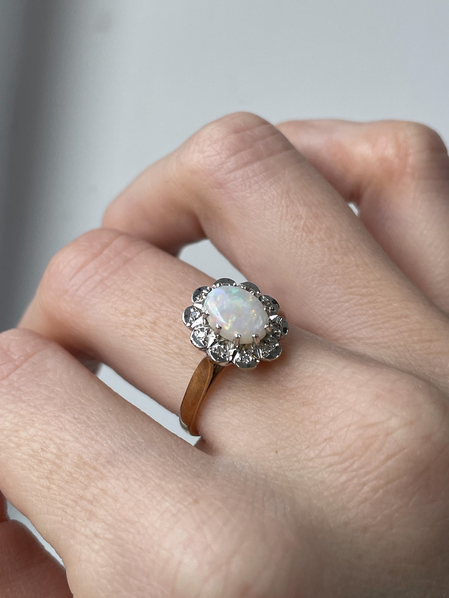 Vintage opal and diamond halo ring from 1988