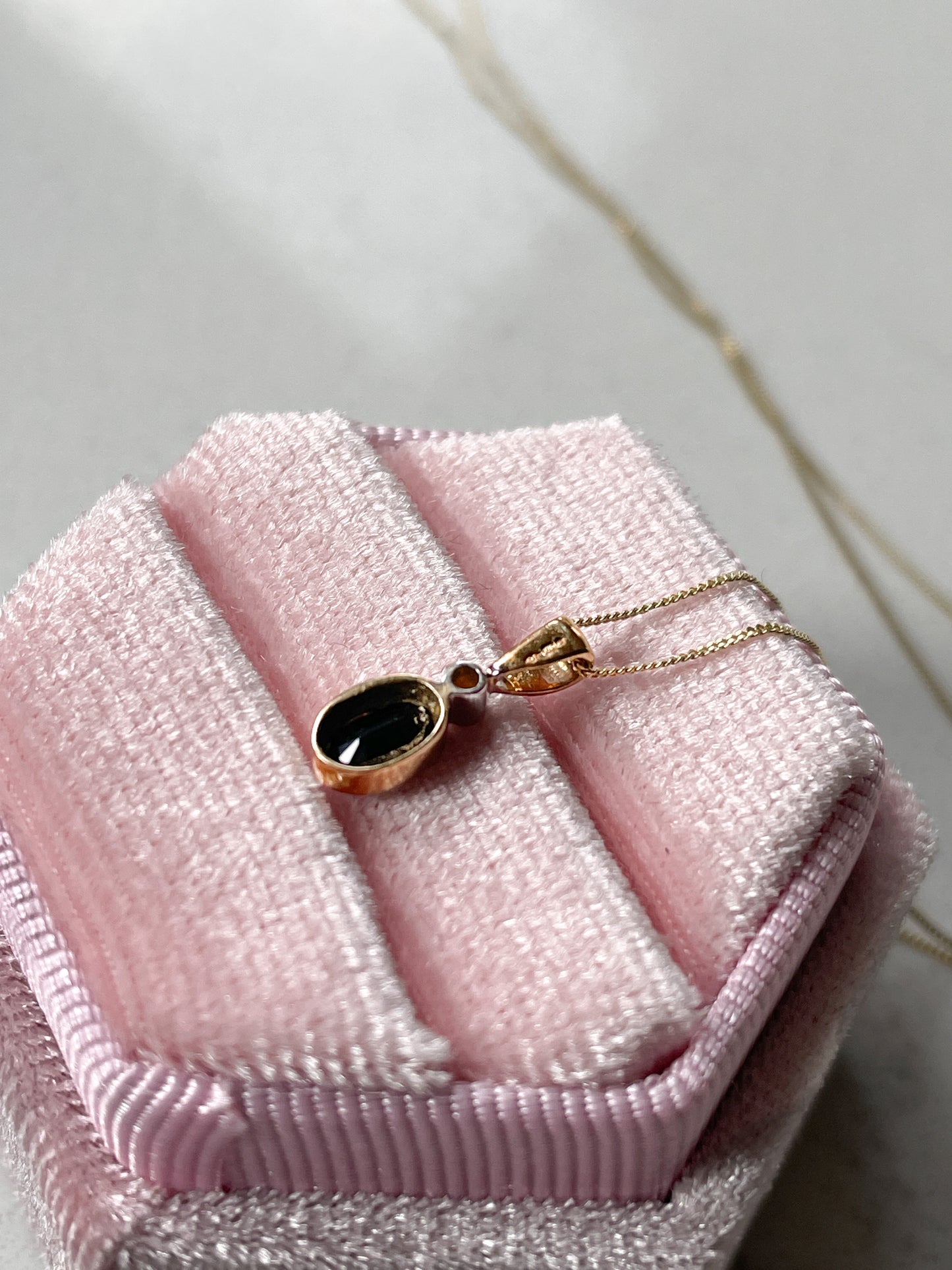 Sapphire and diamond necklace pendant on 9ct gold chain