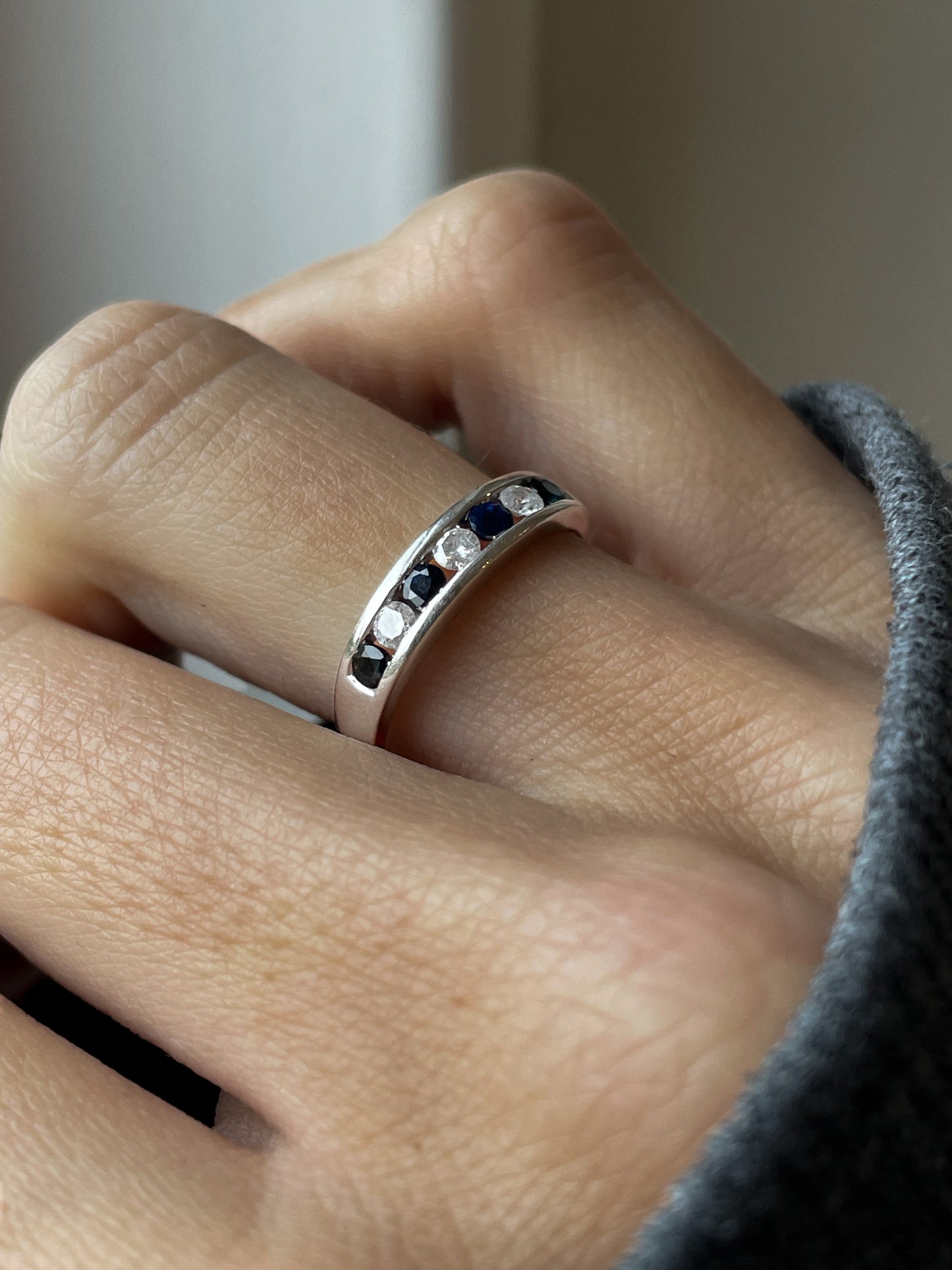 Sapphire and diamond white gold half eternity ring