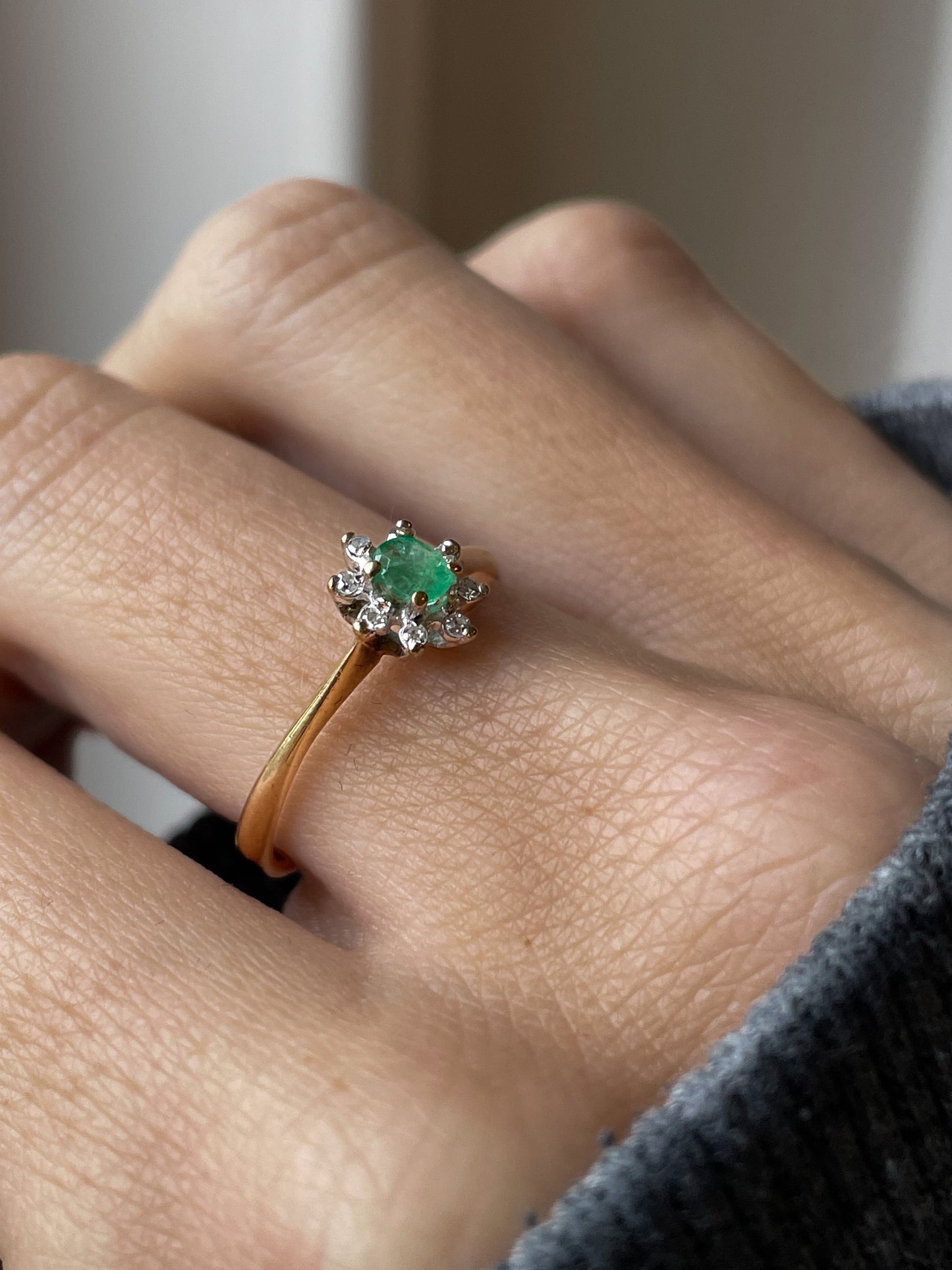 Vintage emerald and diamond cluster ring on 9ct gold