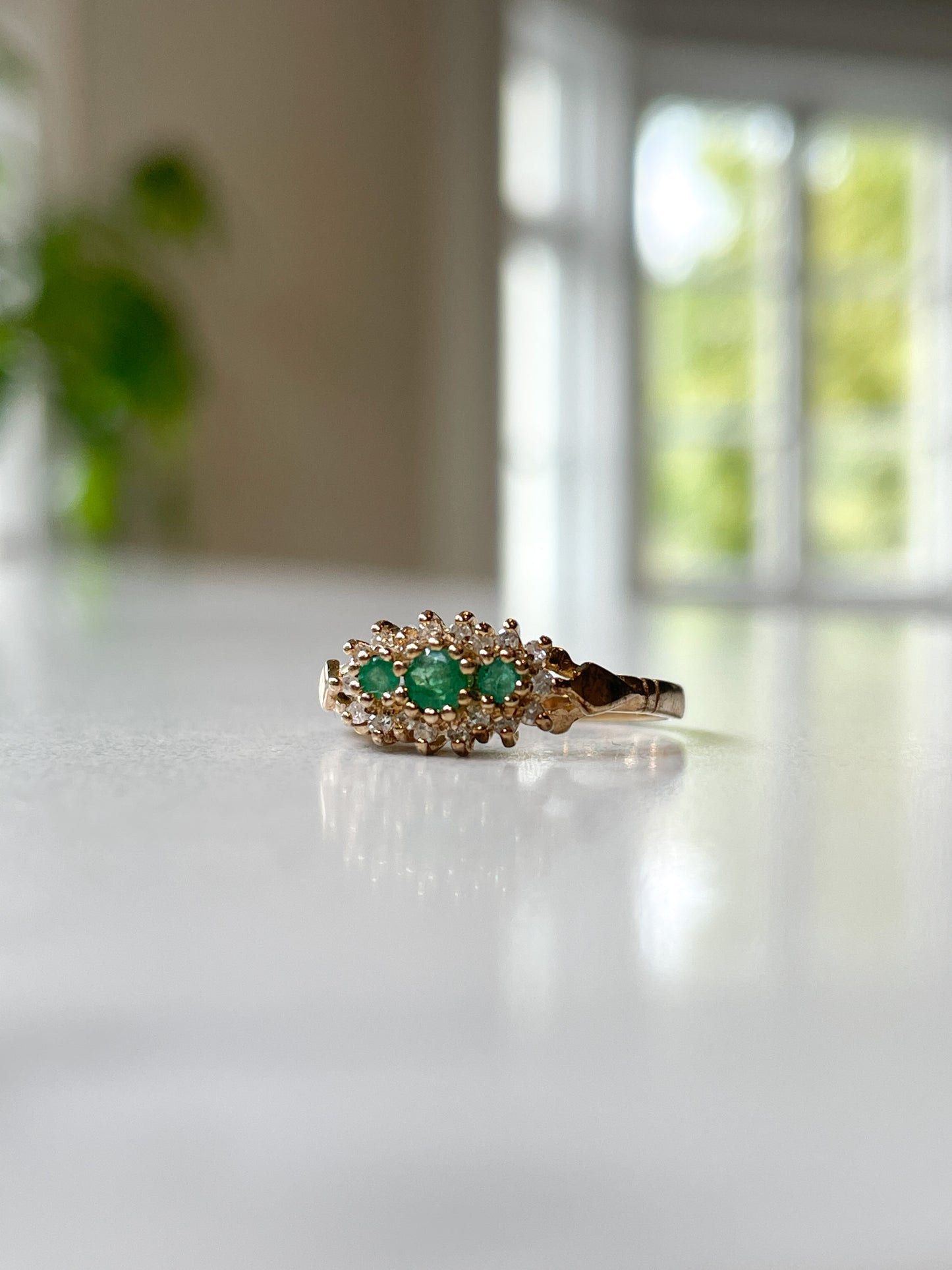 Vintage emerald and diamond ring on 9ct gold