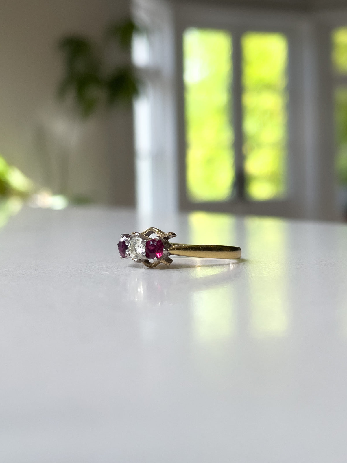 Vintage 1970s ruby and diamond trilogy ring on 18ct gold