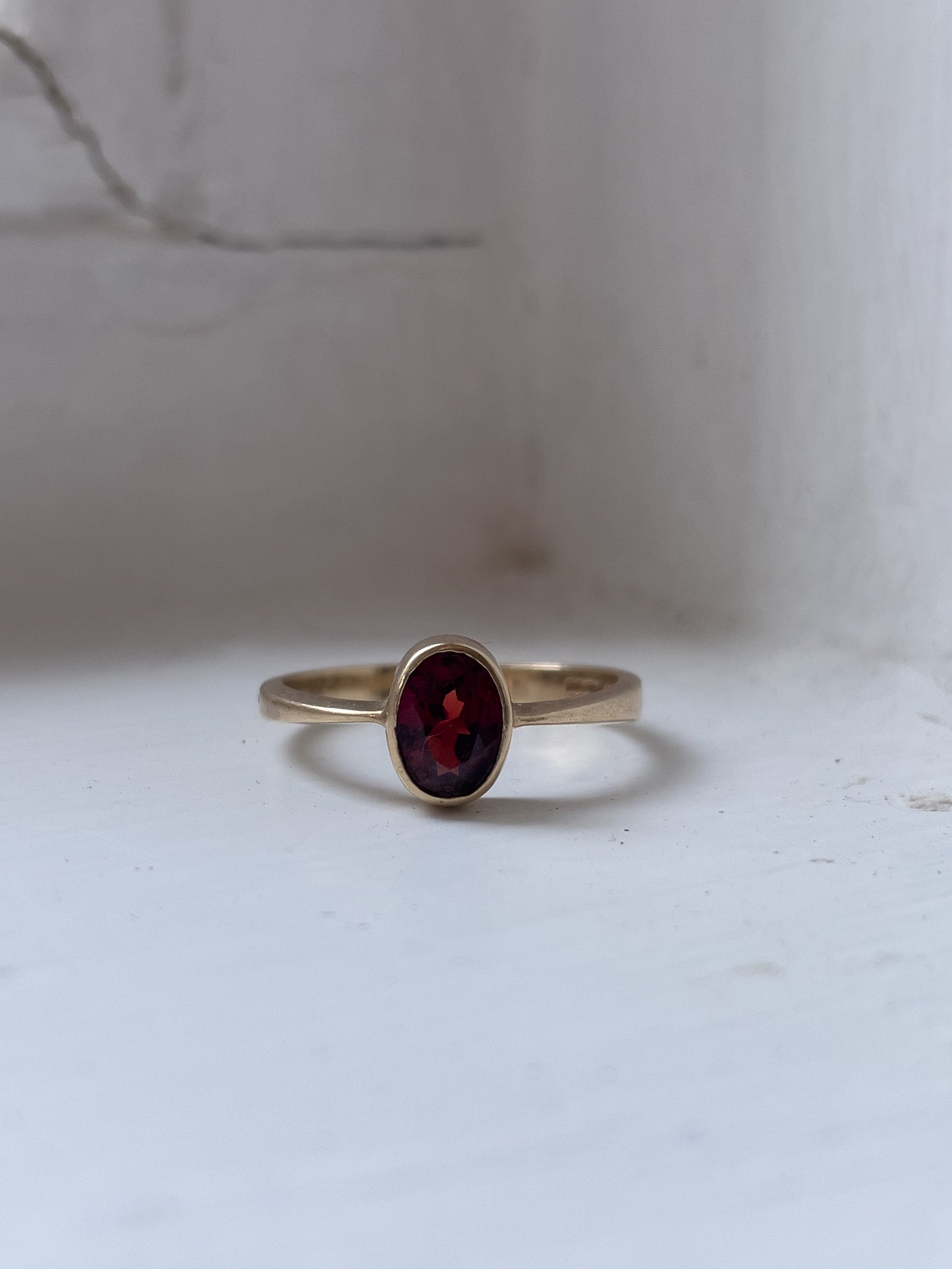 Vintage garnet solitaire ring on 9ct gold