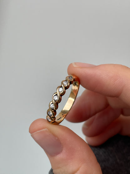 Vintage wavy diamond half eternity ring on 9ct gold