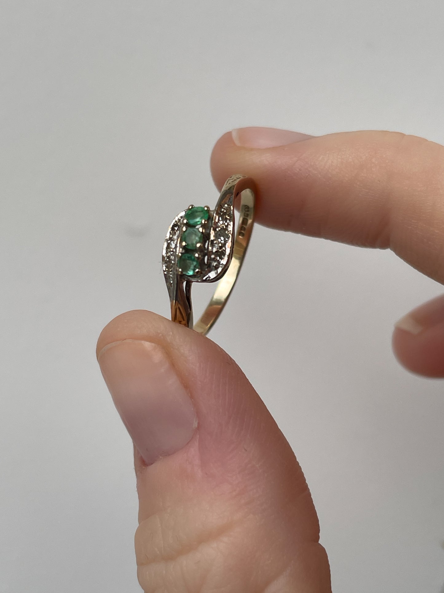 9ct gold emerald and diamond bypass ring from 1982