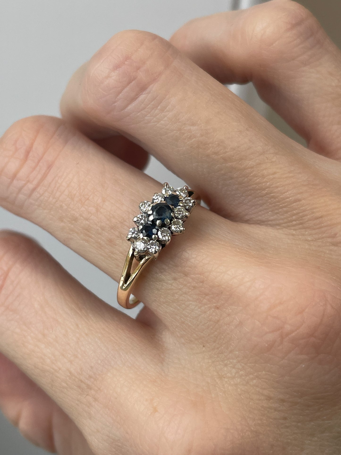 Vintage sapphire and diamond trilogy cluster ring on 9ct gold