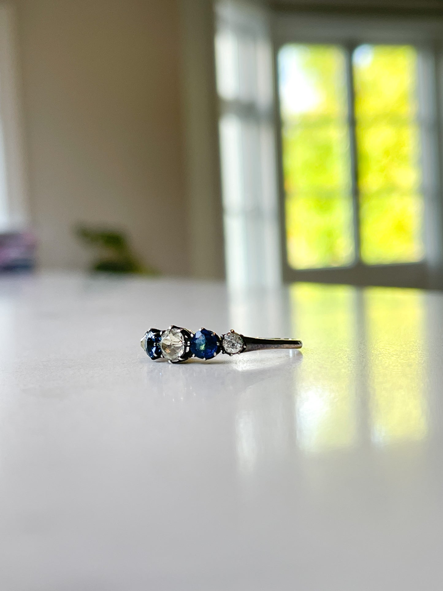 Antique blue and white paste ring on 9ct white gold