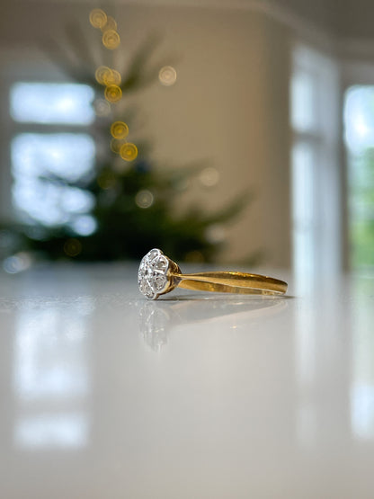 Antique diamond daisy cluster ring on 18ct gold