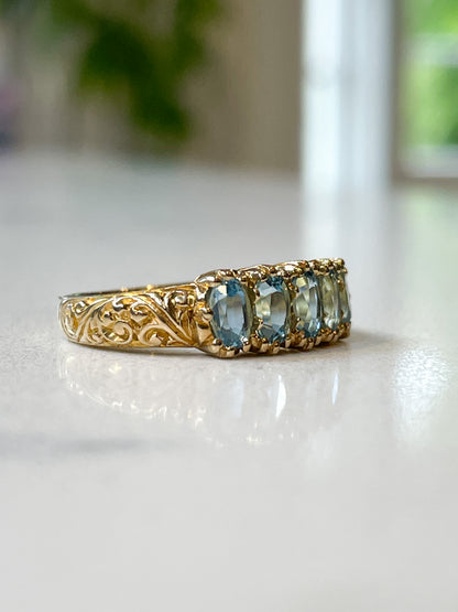 Vintage blue topaz half hoop ring on 9ct gold