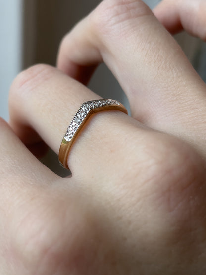 A vintage 9ct gold diamond half wishbone ring