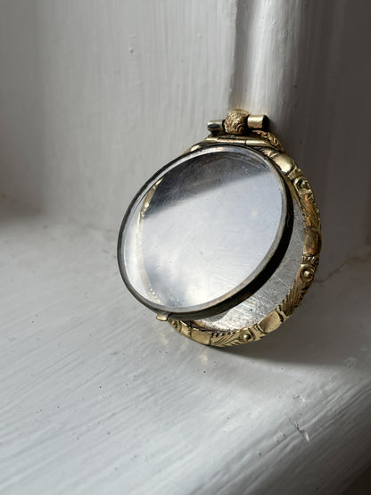 Antique mourning locket with glass cover