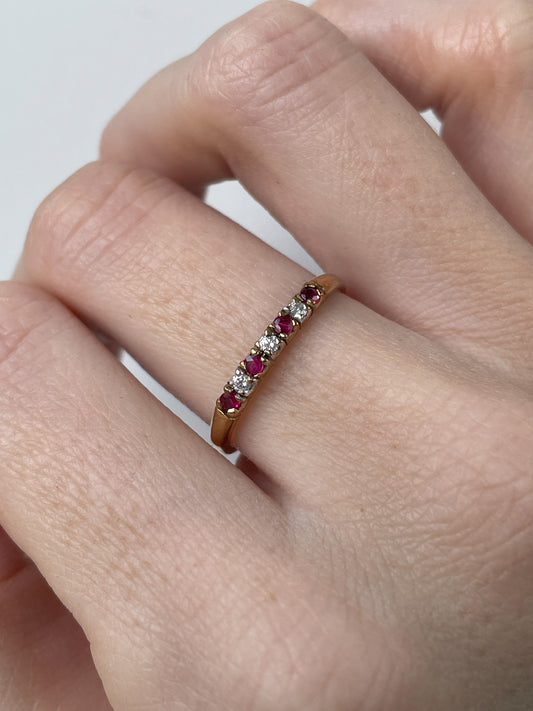Vintage garnet and diamond half eternity ring