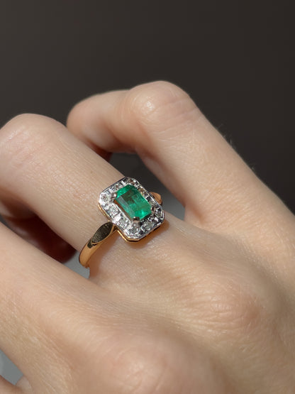 Vintage emerald and diamond halo ring on 9ct gold