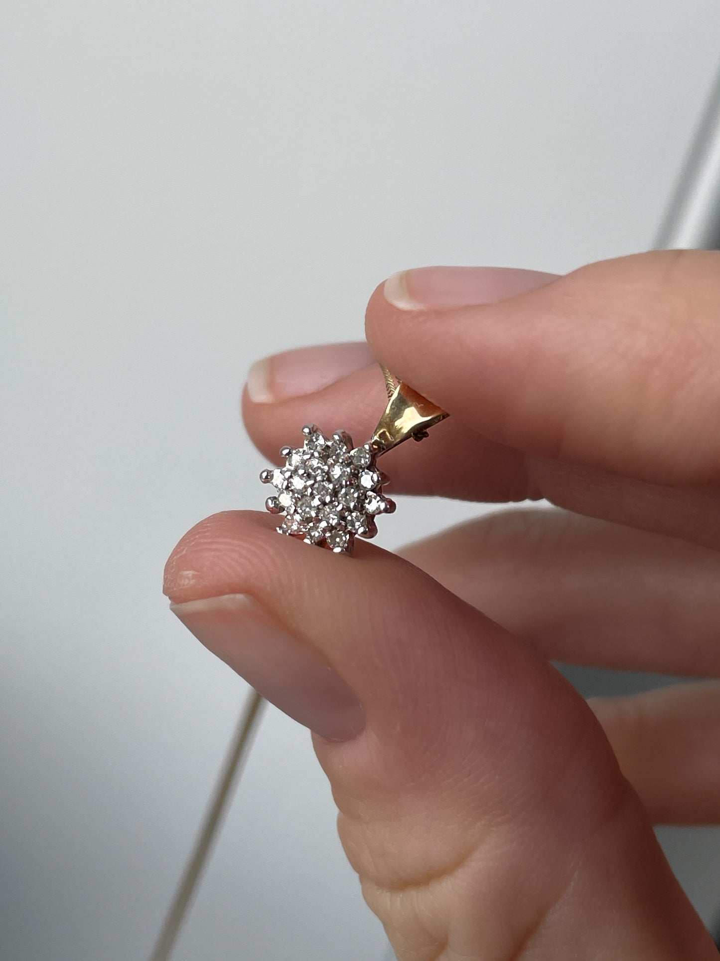 Vintage diamond cluster pendant with 9ct gold chain