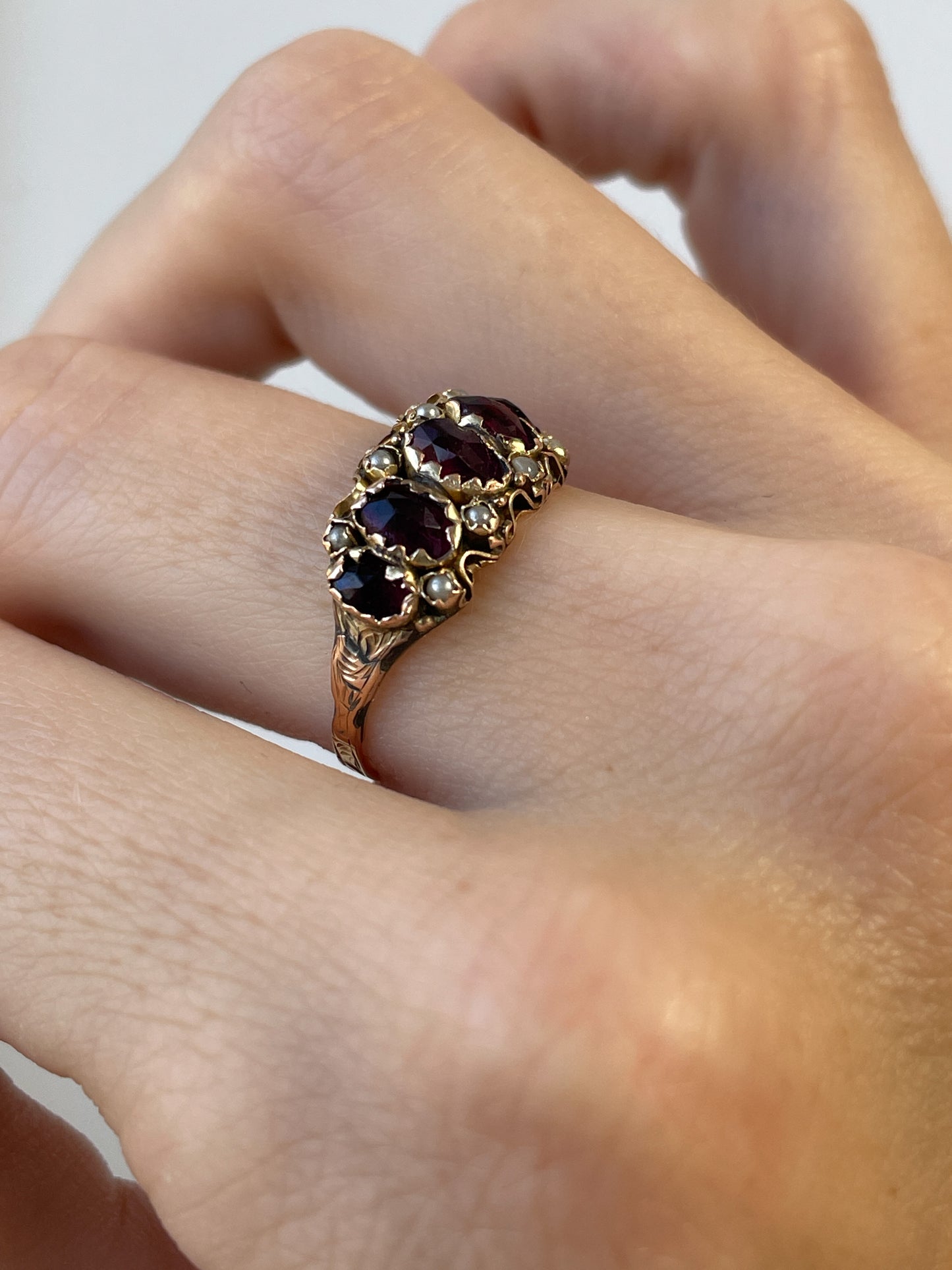 Antique rose-cut garnet and seed pearl ring on 9ct gold