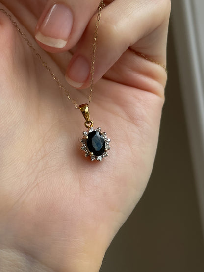 Vintage sapphire and diamond halo cluster pendant and 9ct gold chain