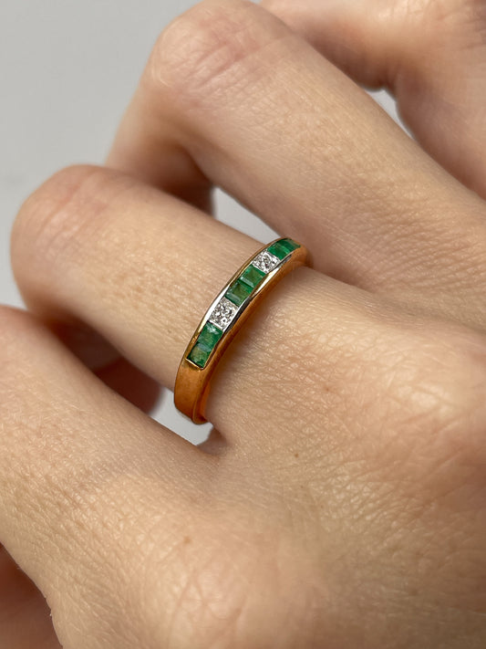 Vintage emerald and diamond half eternity ring