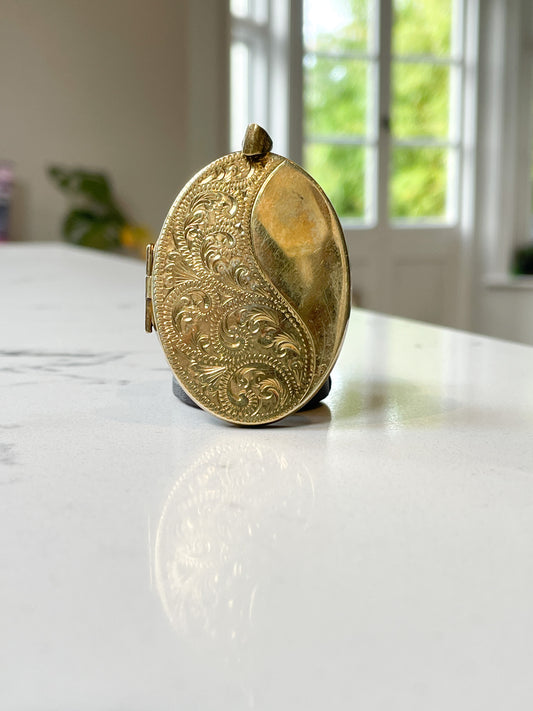 1970s large sterling silver locket with floral design